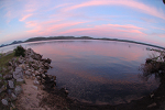 Colorful sky reflecting in Piseco 