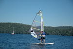 Randy riding the windsurfer