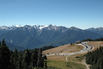 Hurricane Ridge Visitor Center with Carrie Glacier and Mount Olympus (7,980 ft) in the distance