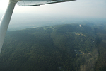Bonticou Crags, a small section of white cliffs and rocky debris along the Shawangunk Ridge, seen on the right