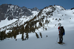 Inspecting the snow-covered bowl to Sam Mack Meadow (right)